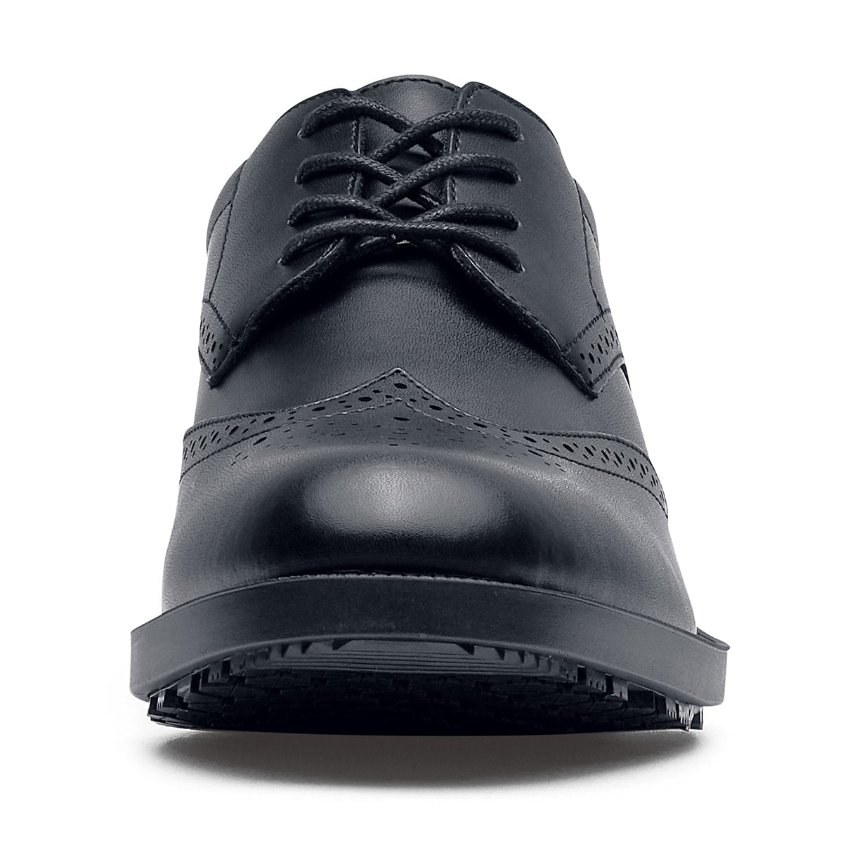 The Executive Wing Tip IV from Shoes For Crews, is an slip resistant dress shoe with a water resistant breathable leather upper to provide industry leading levels of grip and durability, seen from the front.
