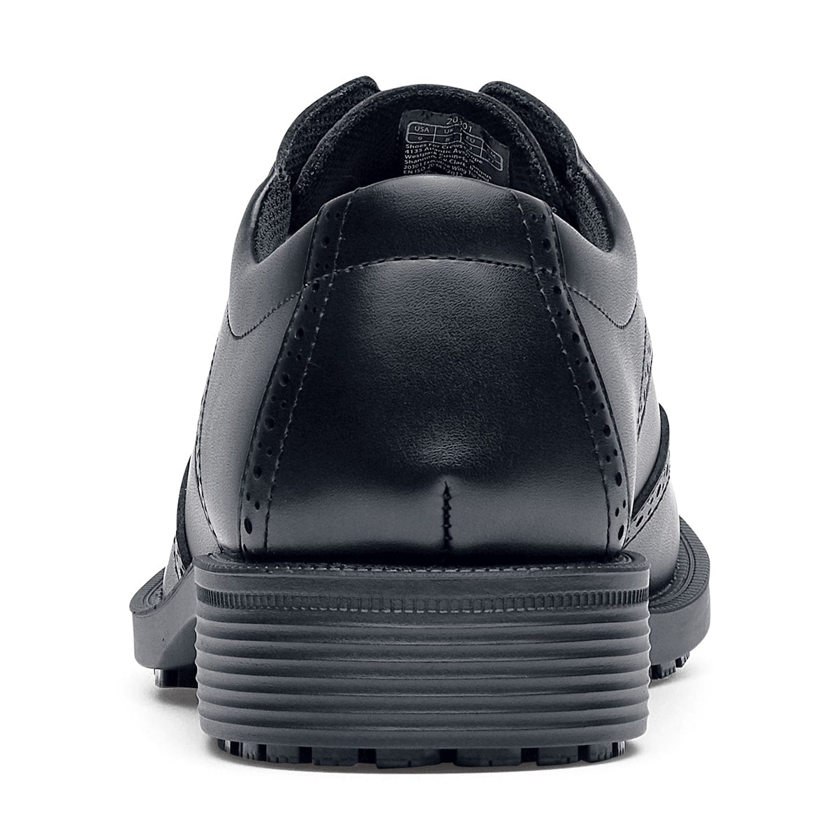 The Executive Wing Tip IV from Shoes For Crews, is an slip resistant dress shoe with a water resistant breathable leather upper to provide industry leading levels of grip and durability, seen from the back.