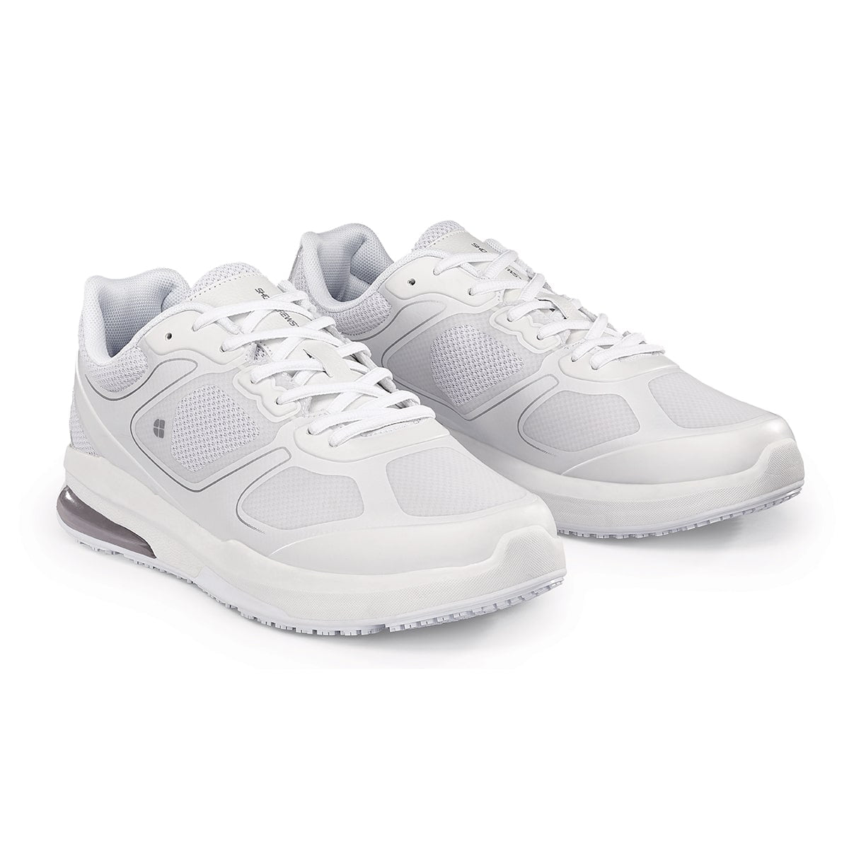 The Evolution II White from Shoes For Crews are slip-resistant and water-resistant trainers,  pair seen in profile on the right.