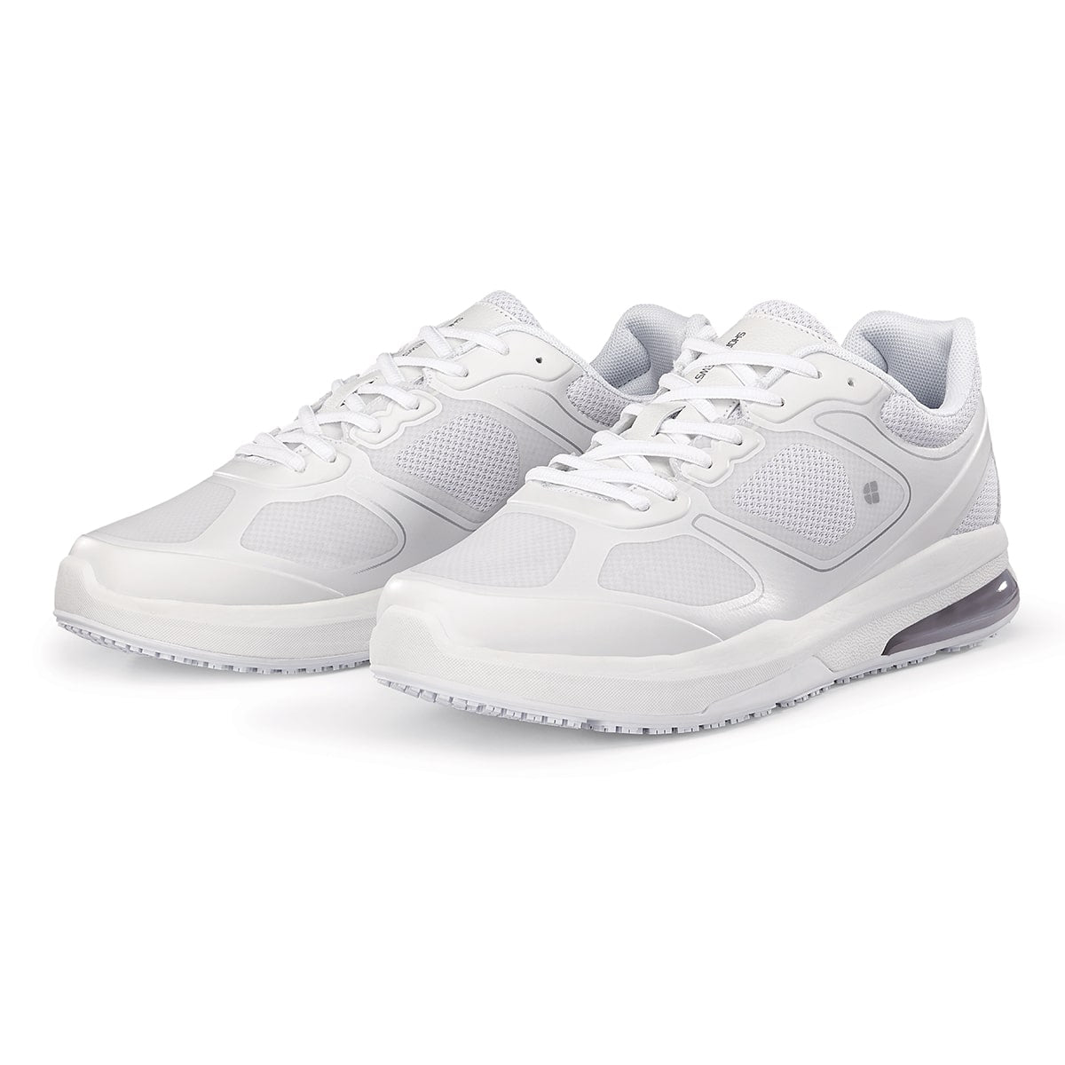 The Evolution II White from Shoes For Crews are slip-resistant and water-resistant trainers,  pair seen in profile on the left.