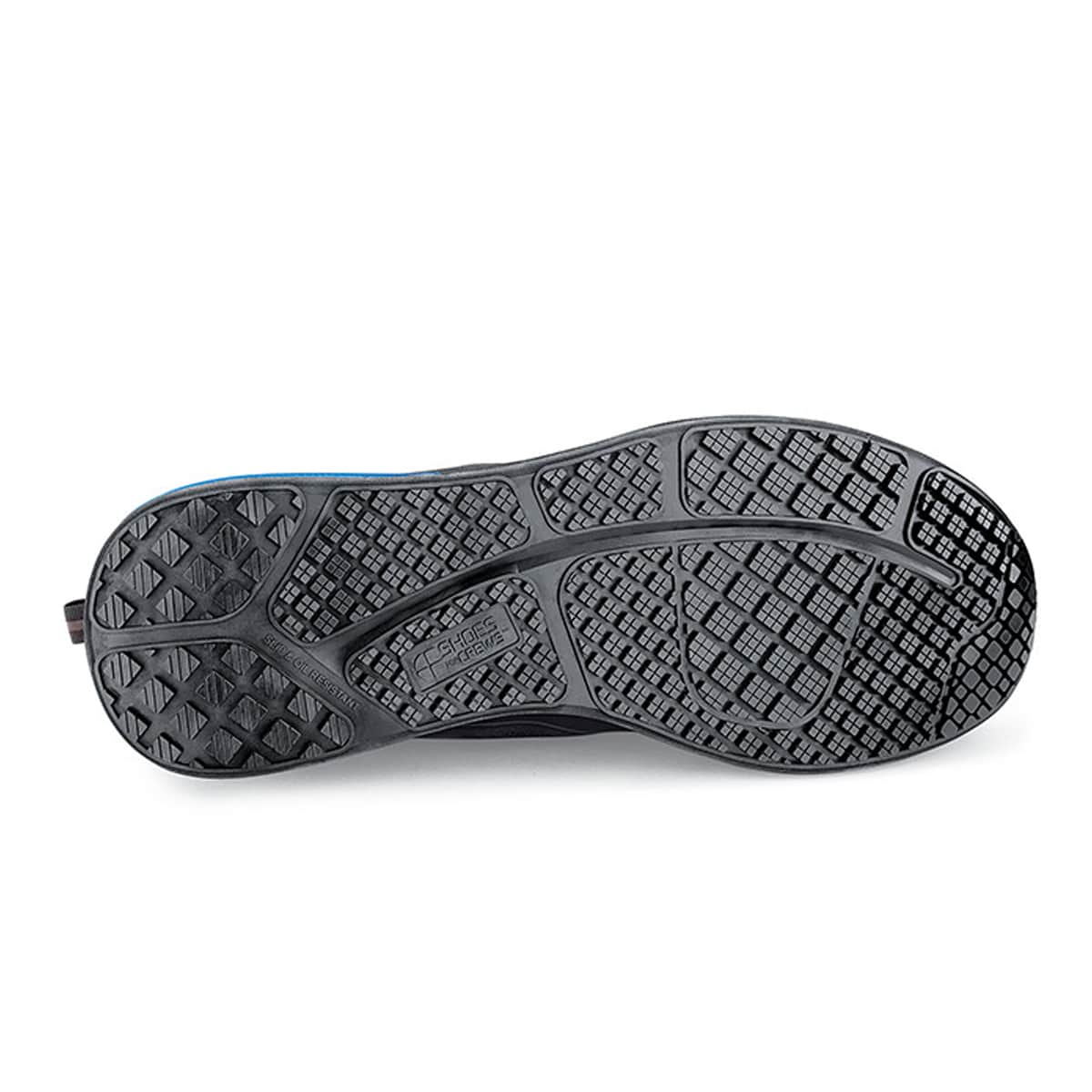 The Revolution II Black from Shoes For Crews are slip-resistant trainers designed to provide comfort, seen from below.