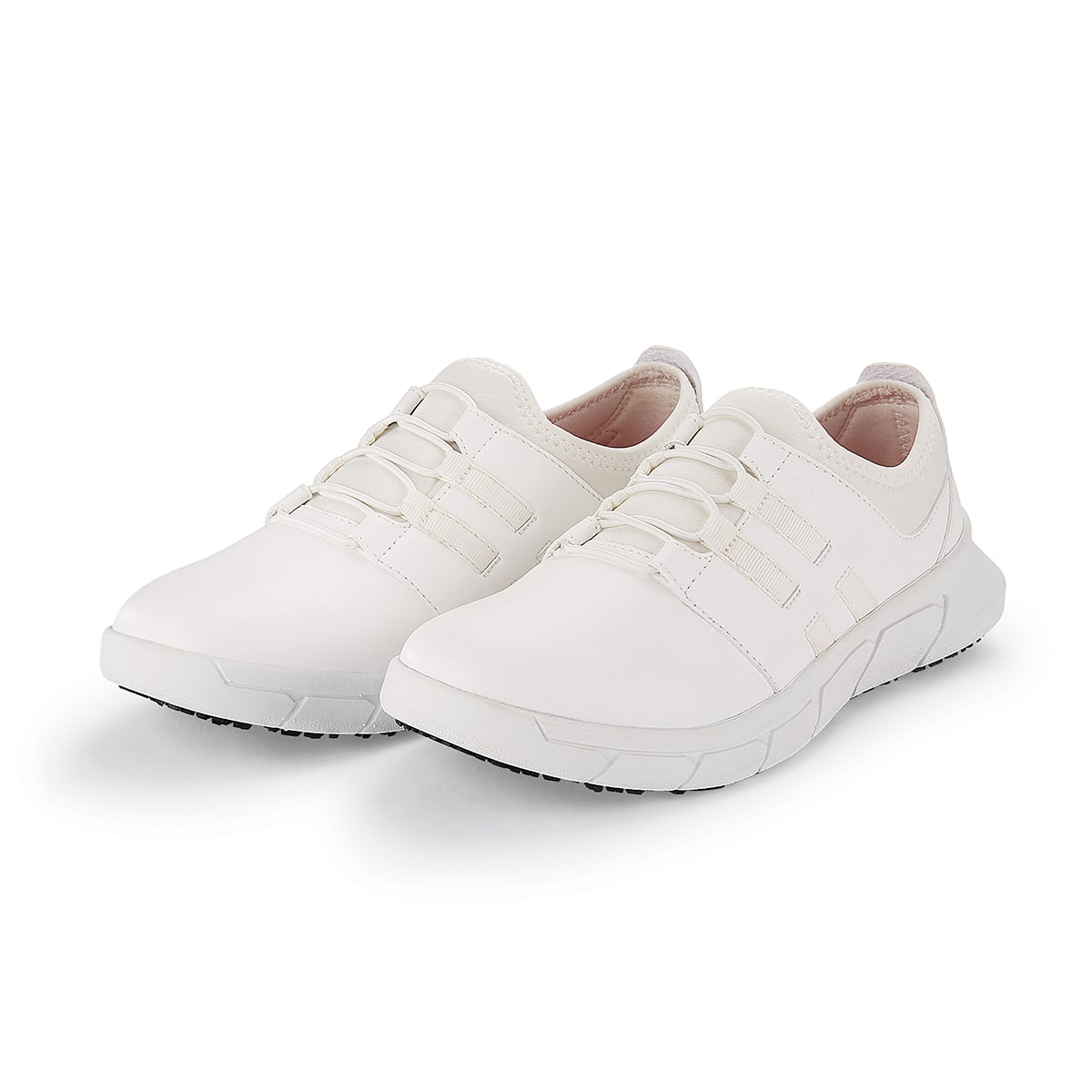 The Karina White by Lila from Shoes For Crews are black slip-resistant trainers that are lightweight and have Flex Tread technology, pair seen in profile on the right.