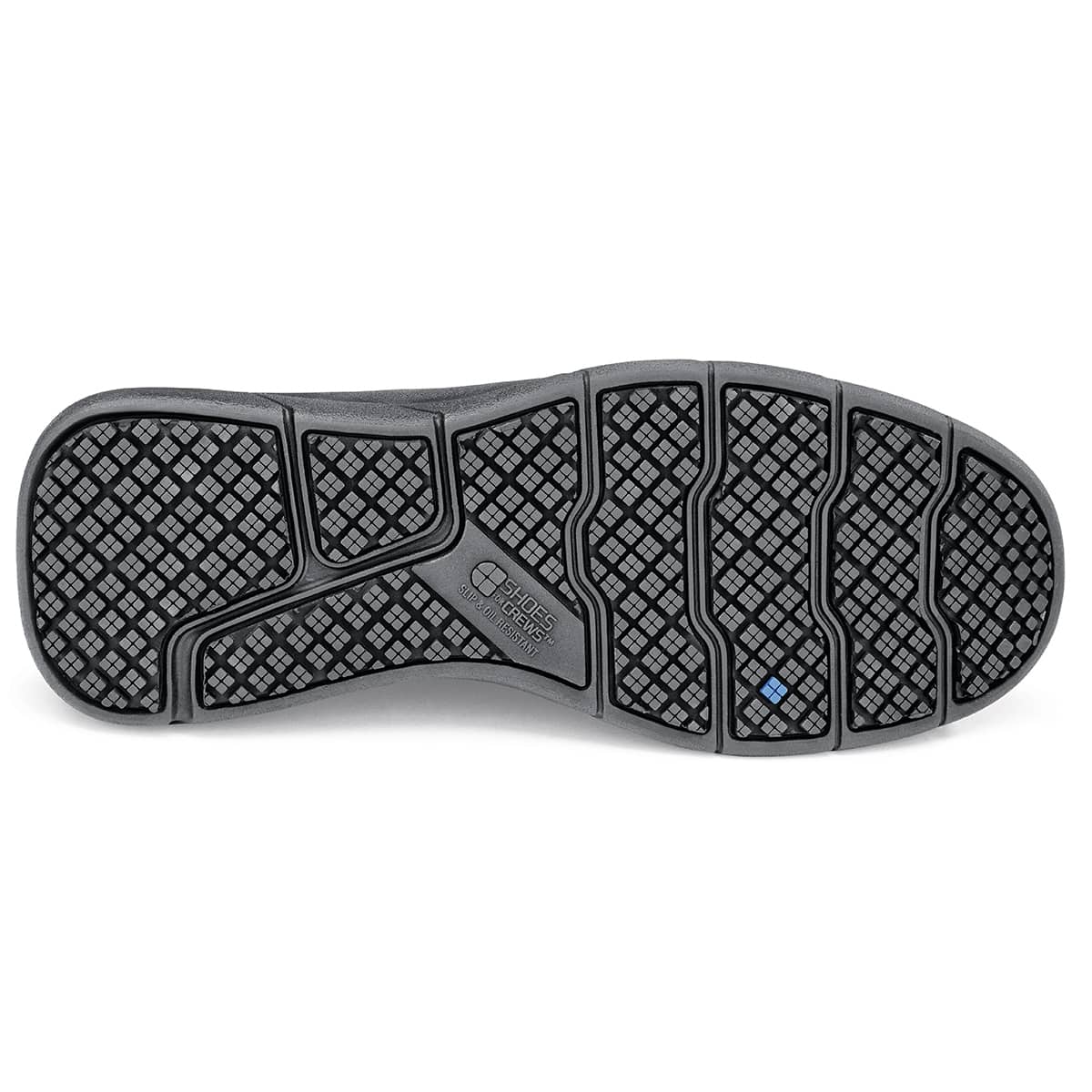 The Karina Black by Lila from Shoes For Crews are black slip-resistant trainers that are lightweight and have Flex Tread technology, seen from below.