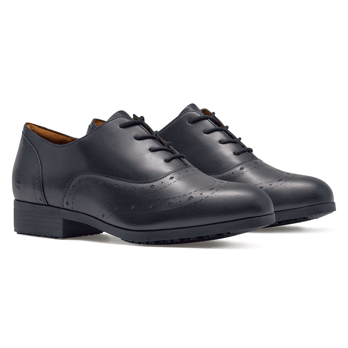 The Kora from Shoes For Crews are slip-resistant dress shoes, pair seen in profile on the right.