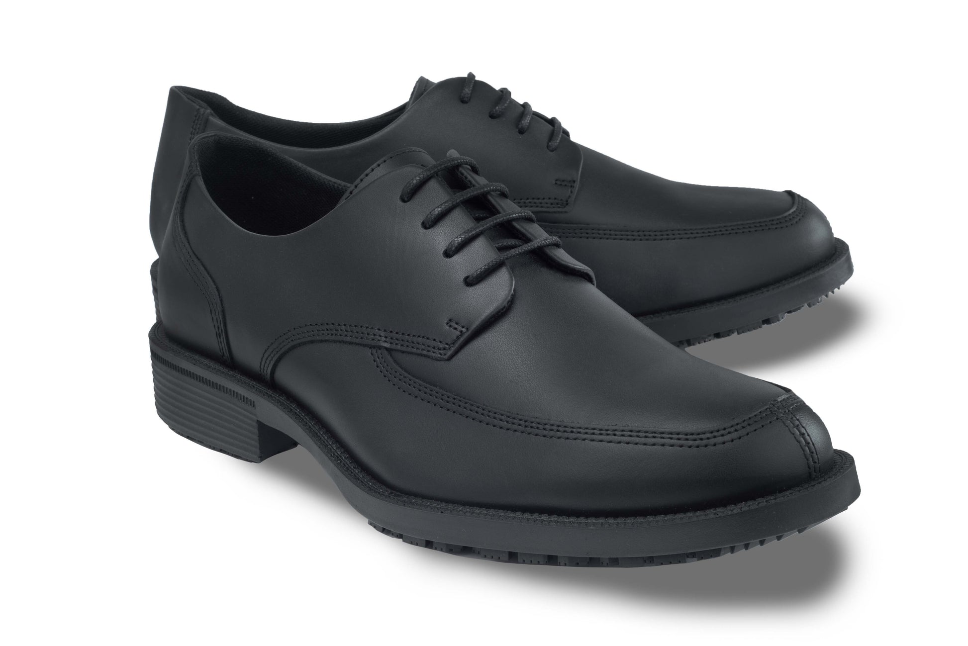 Slip resistant black formal shoe with waterproof leather upper and a removable, cushioned insole, pair seen in profile on the right.