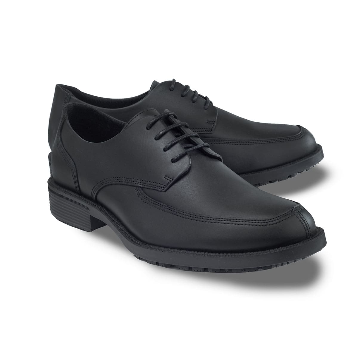 Slip resistant black formal shoe with waterproof leather upper and a removable, cushioned insole, pair seen from the tip of the right shoe.