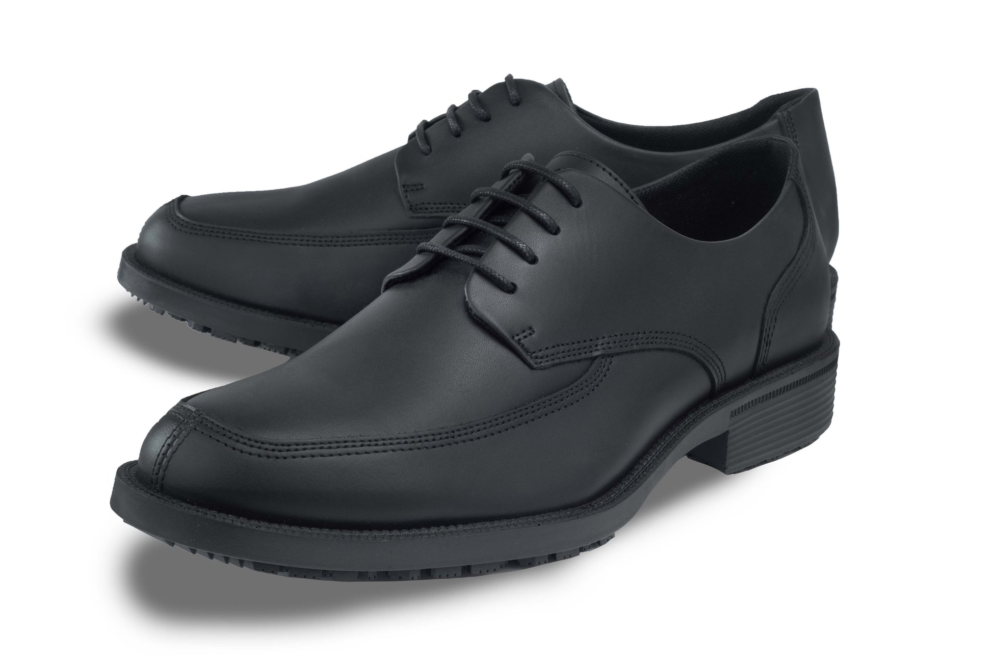 Slip resistant black formal shoe with waterproof leather upper and a removable, cushioned insole, pair seen in profile on the left.