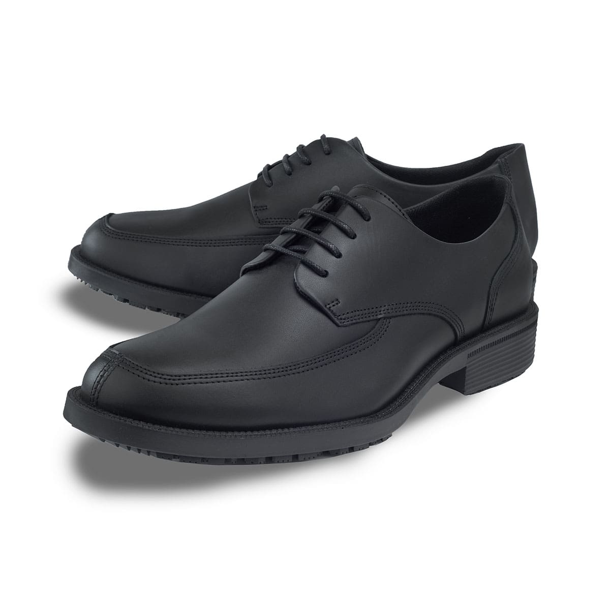 Slip resistant black formal shoe with waterproof leather upper and a removable, cushioned insole, pair seen from the tip of the left shoe.