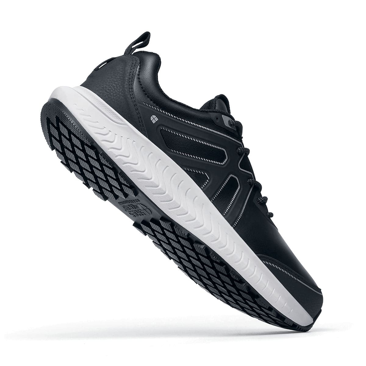 The Colly Soft Toe from Shoes For Crews are slip-resistant shoes that offer superior TripGuard technology, a water-resistant upper and arch support, seen perpendicular with emphasis on the heel.