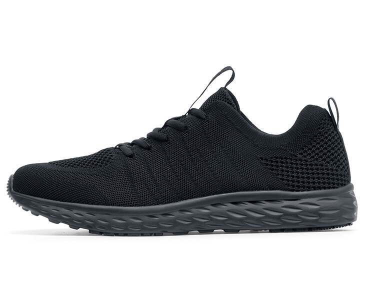 The Everlight Mens Black from Shoes For Crews are breathable slip-resistant trainers which are lightweight and easy to clean, seen from the left.