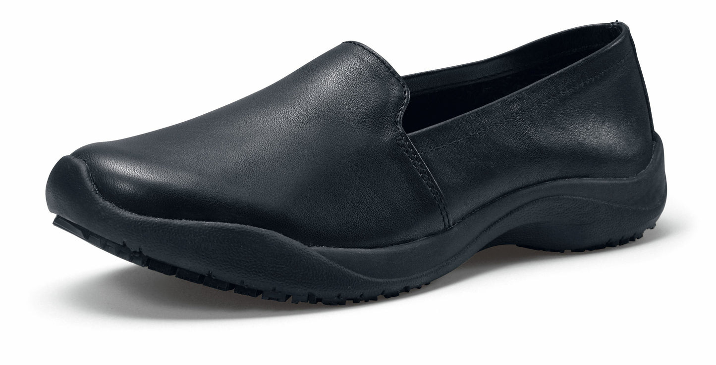 The Jasmine Black by Lila from Shoes for Crews are slip-resistant, casual, lightweight and water-resistant shoes, seen from the left profile.