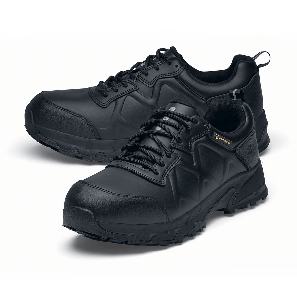The Callan low-cut shoe is slip-resistant and has a breathable, waterproof upper as well as insulation for cold and heat, pair seen in profile highlighting the tip of the left shoe.
