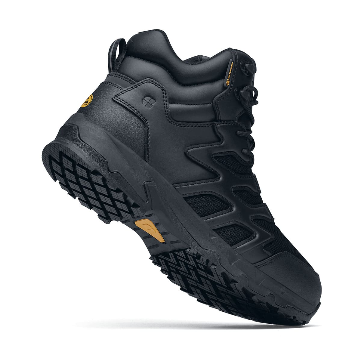 The Shoes for Crews Carrig Mid is a slip-resistant safety boot with a waterproof upper, seen in profile from the right side highlighting the heel .