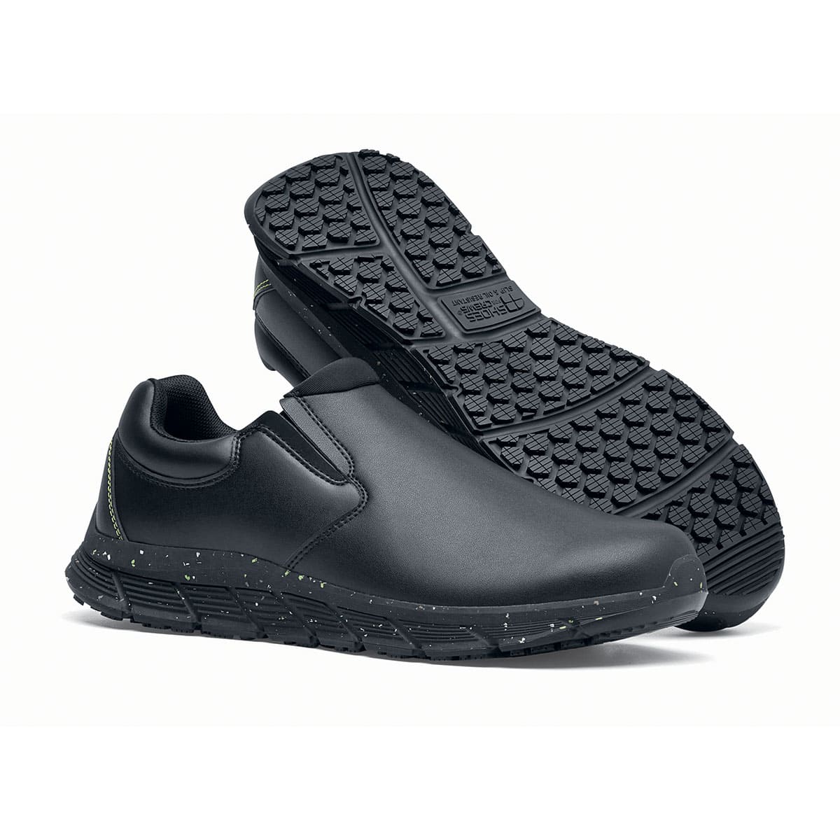 The Shoes for Crews Cater Eco Women's Black is a sustainable, slip-resistant safety shoe, pair seen from the right side and sole.