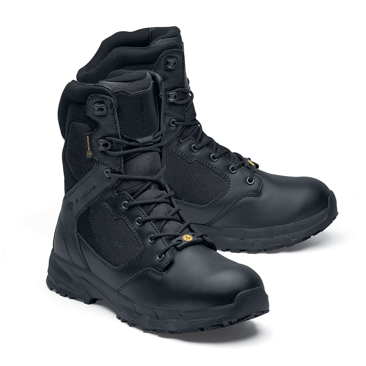 Darver from Shoes For Crews are safety boots with a superior slip-resistant outsole and materials resistant to water- and blood-borne pathogens, pair seen from the left side, emphasised on the tip of the left shoe.