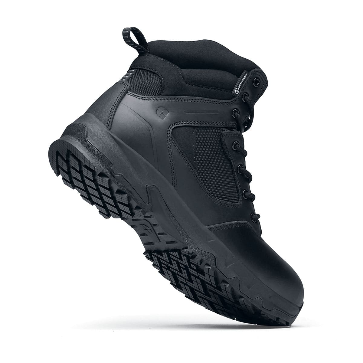 The Defence Mid from Shoes For Crews are waterproof, slip-resistant safety boots, seen from the perpendicular.