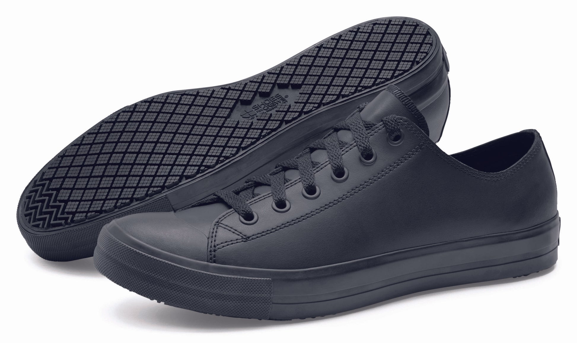The Delray from Shoes For Crews is a lace-up shoe that has a slip-resistant upper sole with a tapered edge to prevent the risk of trips and falls, pair seen from the left and bottom.