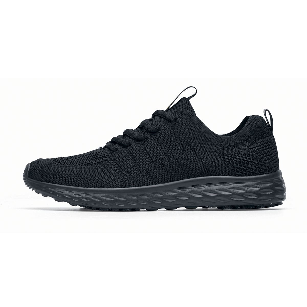 The Everlight™ Everlight Eco Women's Black from Shoes For Crews are lightweight and breathable slip-resistant trainers made from recycled materials, seen from the left.
