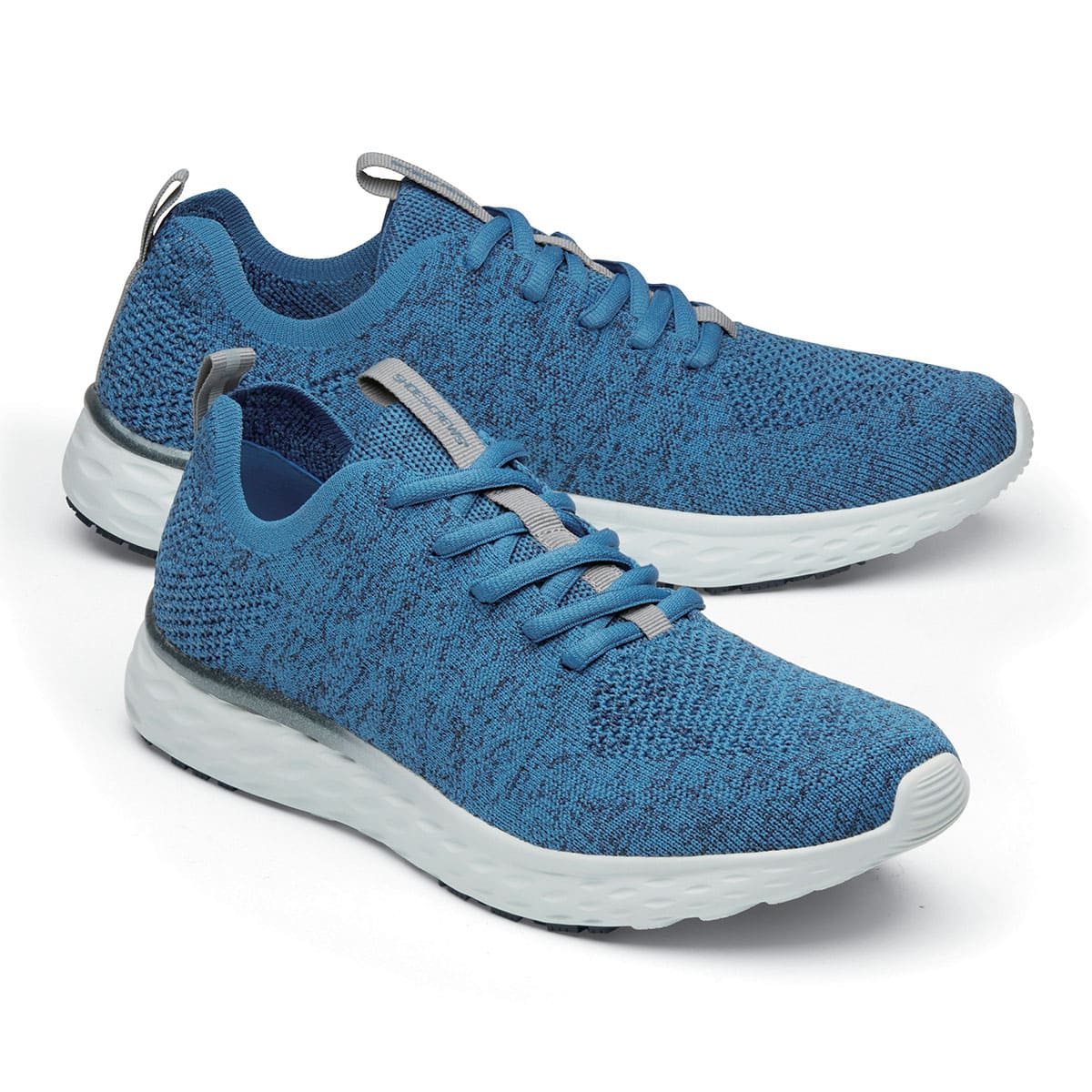 The Everlight Mens Ocean Blue from Shoes For Crews are slip-resistant, breathable, lightweight and easy-to-clean trainers, pair seen from the right side, emphasised on the tip of the right  shoe.