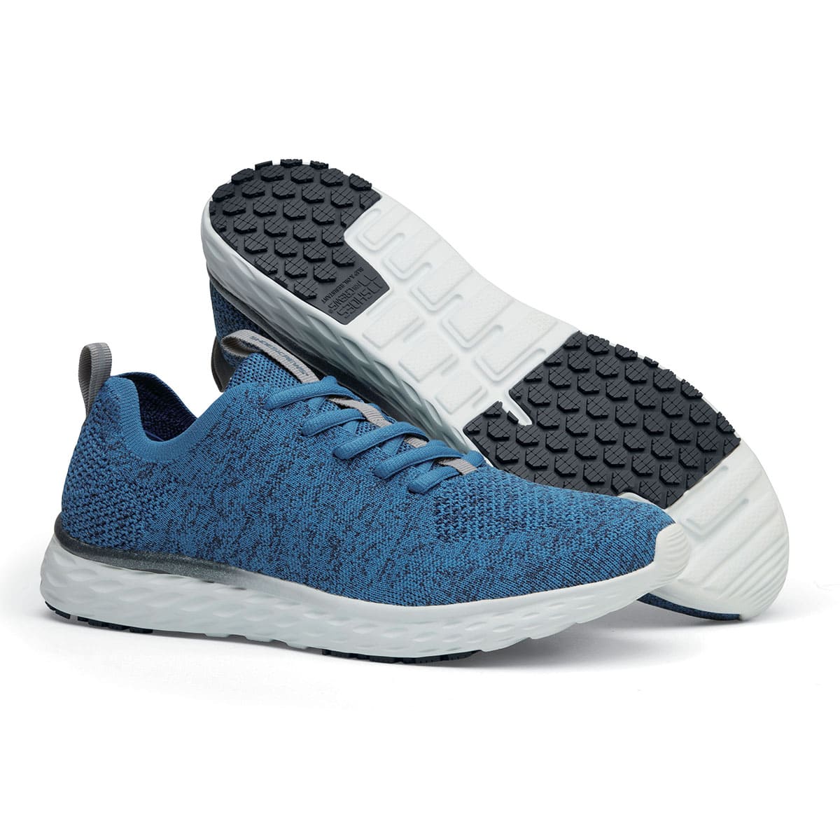 The Everlight Mens Ocean Blue from Shoes For Crews are slip-resistant, breathable, lightweight and easy-to-clean trainers, pair seen from the right side and the sole.