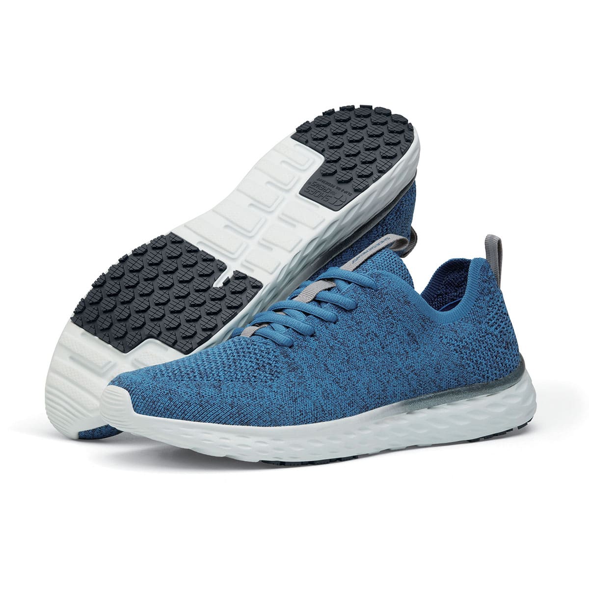 The Everlight Mens Ocean Blue from Shoes For Crews are slip-resistant, breathable, lightweight and easy-to-clean trainers, pair seen from the left side and the sole.