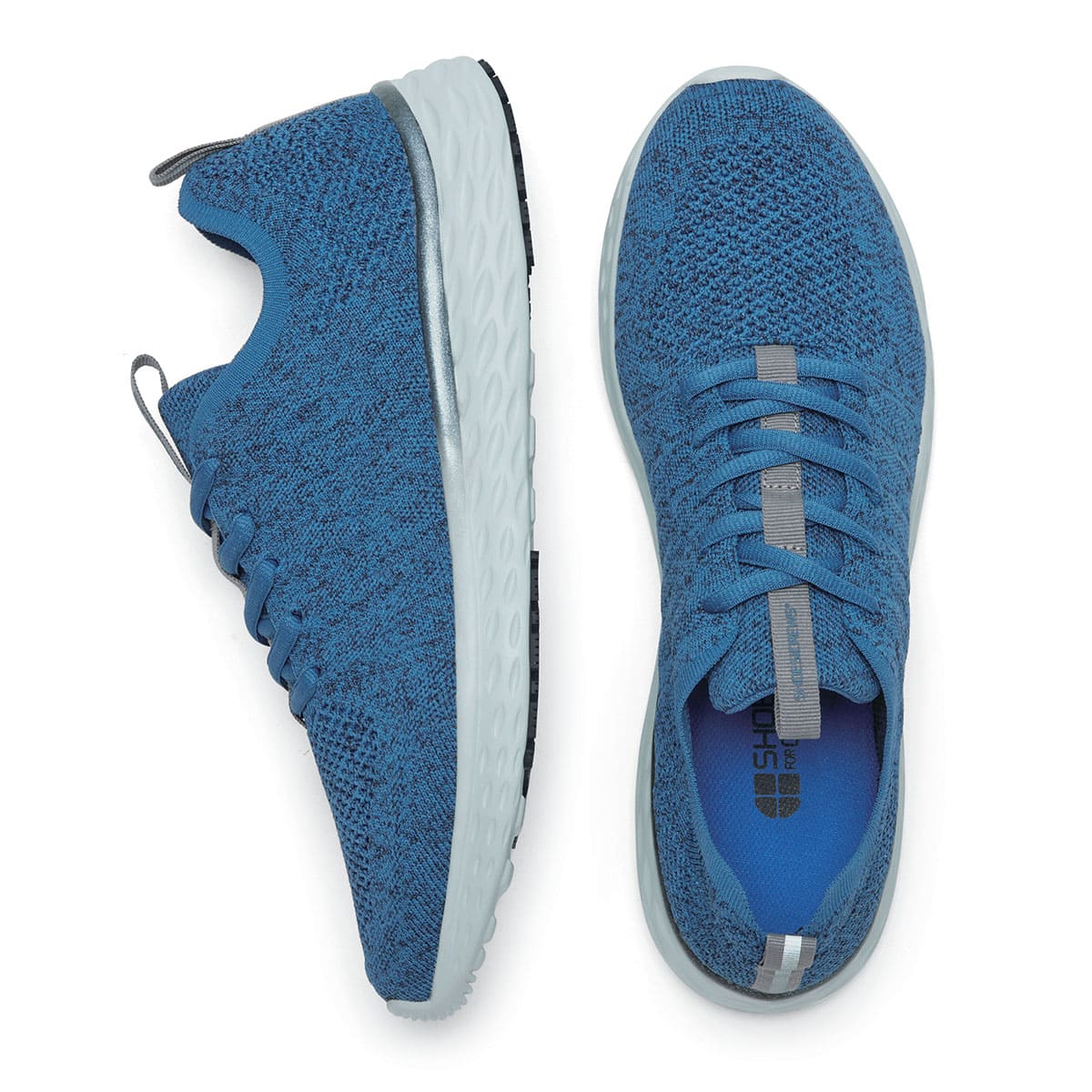 The Everlight Mens Ocean Blue from Shoes For Crews are slip-resistant, breathable, lightweight and easy-to-clean trainers, viewed from the side and bottom at a vertical angle.