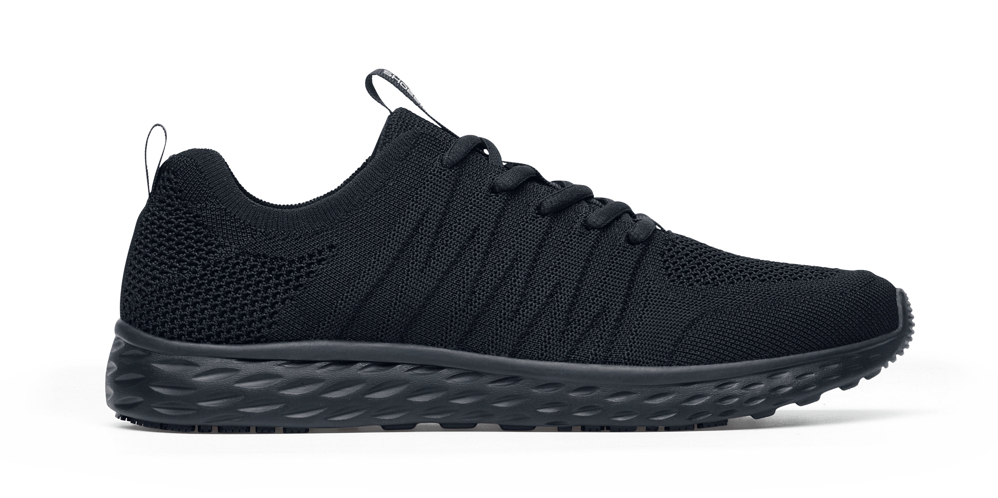 The Everlight Ce Womens Black from Shoes For Crews are slip-resistant trainers with TripGuard technology, removable cushioned insoles and are also breathable, seen from the right.