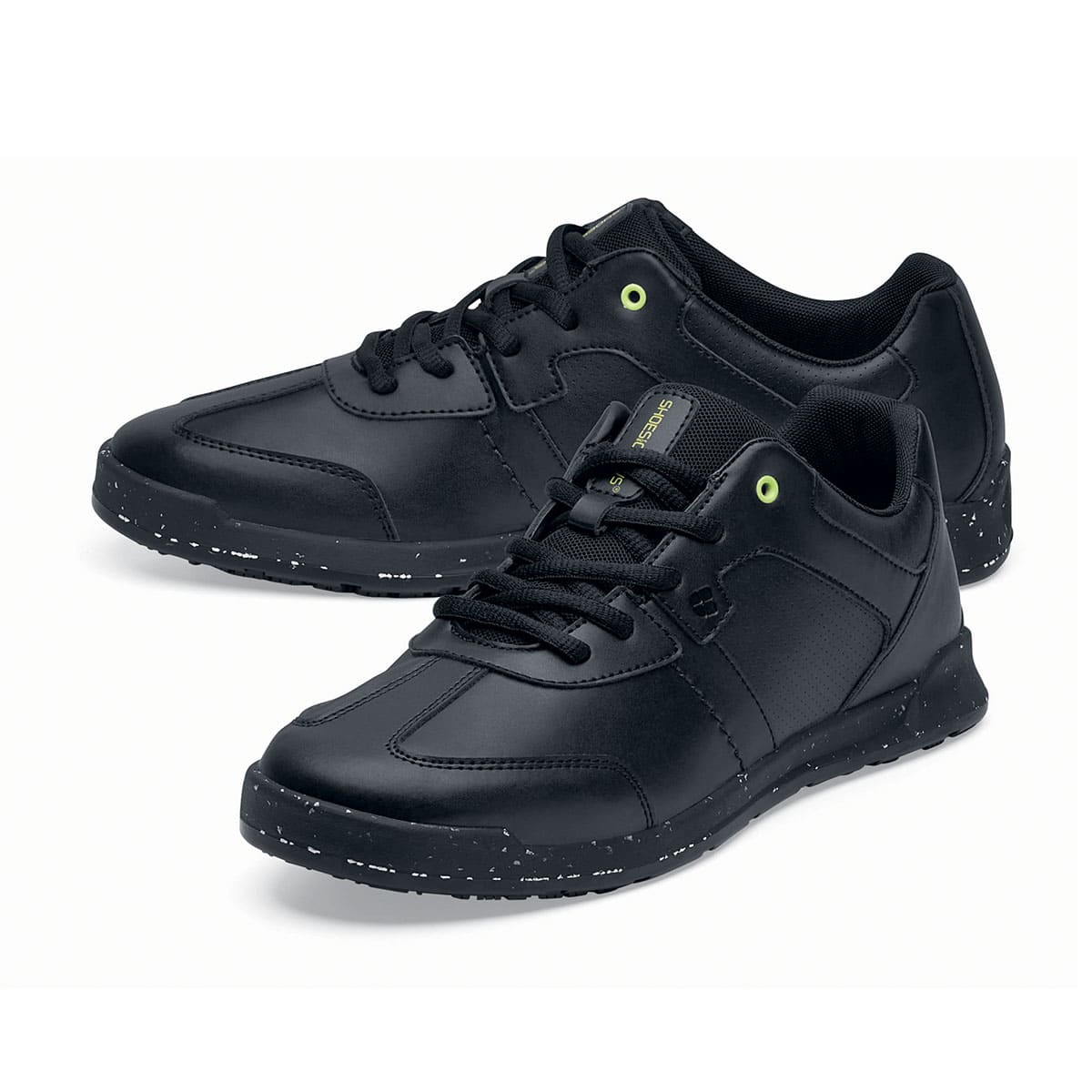 The Freestyle II Eco from Shoes For Crews are slip-resistant, lightweight shoes made from sustainable materials, pair seen from the left side, emphasised on the tip of the left shoe.