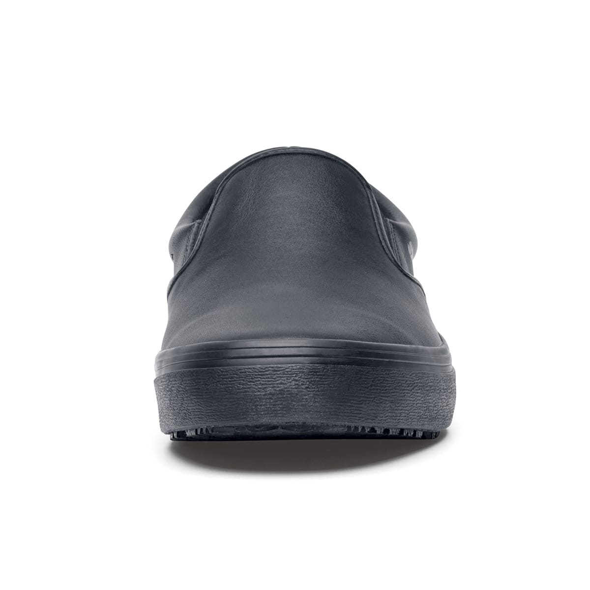The Merlin Black from Shoes For Crews are slip-on slip resistant shoes with a lightweight design and constructed from genuine leather that has been specially treated to repel liquids from the surface, seen from the front.