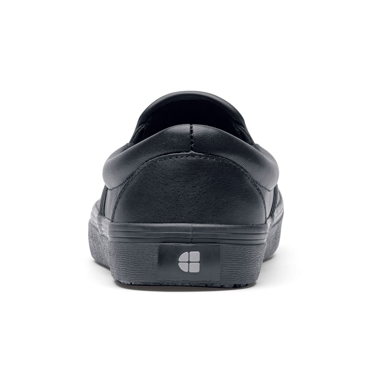 The Merlin Black from Shoes For Crews are slip-on slip resistant shoes with a lightweight design and constructed from genuine leather that has been specially treated to repel liquids from the surface, seen from the back.