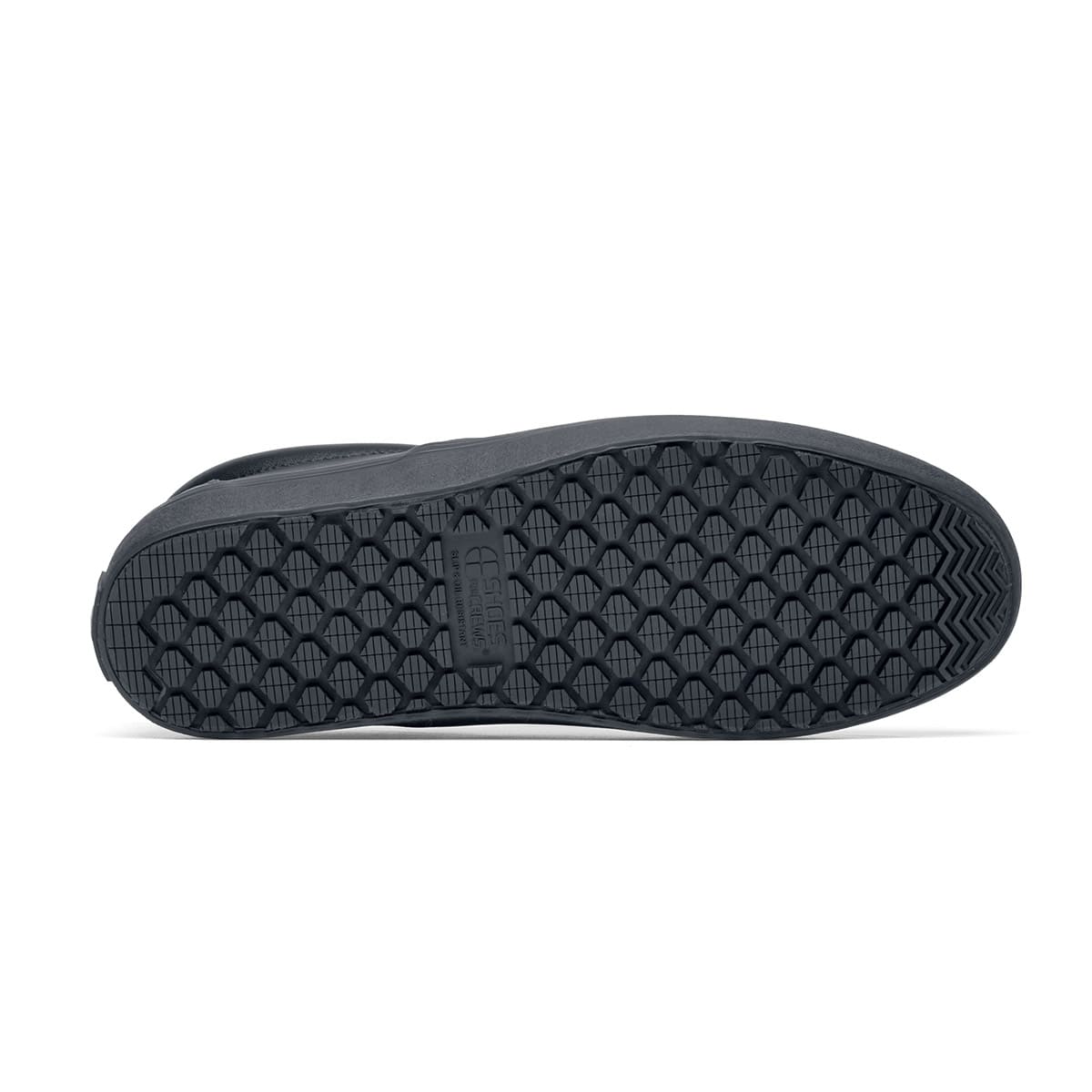 The Merlin Black from Shoes For Crews are slip-on slip resistant shoes with a lightweight design and constructed from genuine leather that has been specially treated to repel liquids from the surface, seen from below.
