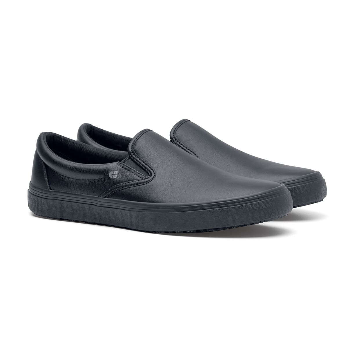 The Merlin Black from Shoes For Crews are slip-on slip resistant shoes with a lightweight design and constructed from genuine leather that has been specially treated to repel liquids from the surface, pair seen in profile on the right.