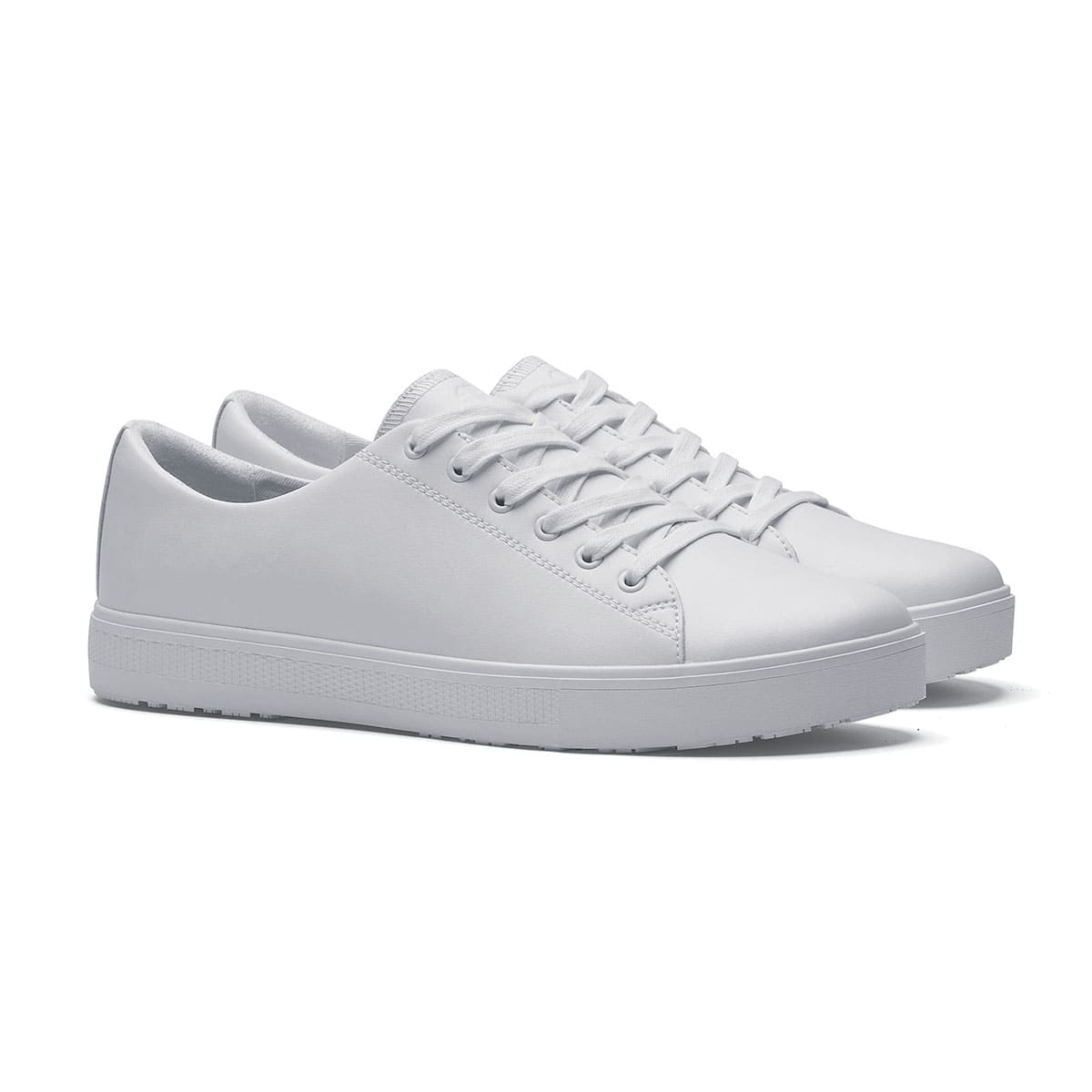 The Old School Low-Rider White from Shoes For Crews is a slip resistant lace-up designed to provide comfort throughout the day, pair seen in profile on the right.