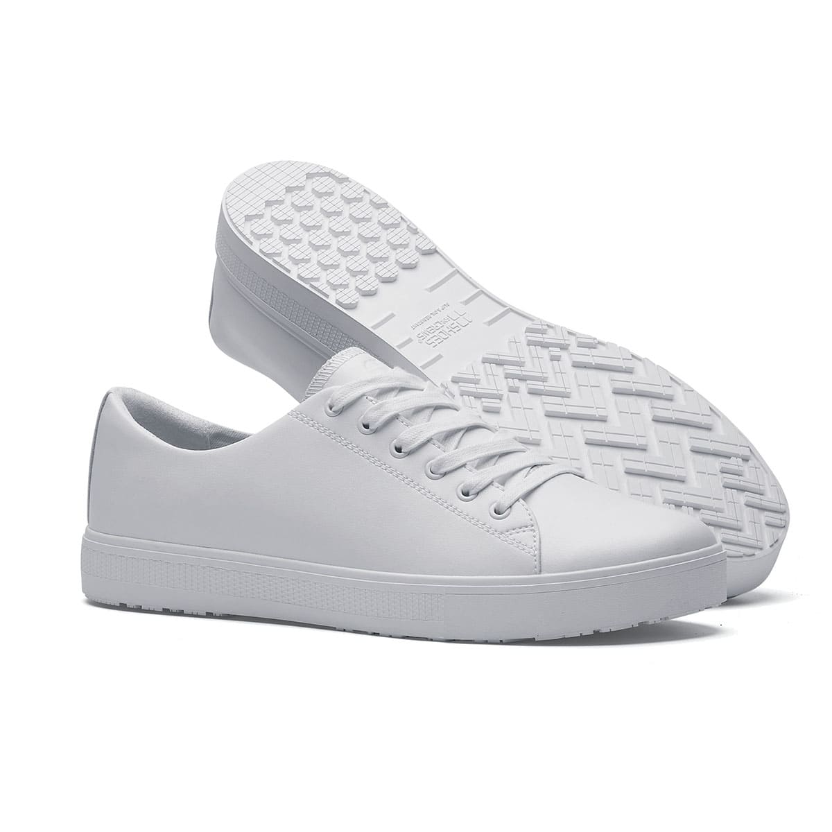 The Old School Low-Rider White from Shoes For Crews is a slip resistant lace-up designed to provide comfort throughout the day, pair seen from the right side and the sole.