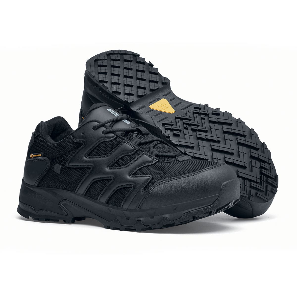 The Carrig Low O2 SRC CI HI ESD from Shoes For Crews is a slip-resistant, waterproof, breathable and lightweight hiker shoe ideal for daily use, pair seen from the right side and the sole.