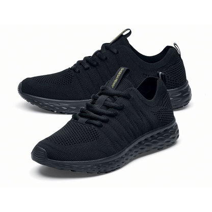 The Everlight™ Eco Men's Black from Shoes For Crews are slip-resistant trainers built with a recycled mesh upper that is water-resistant and breathable. Designed to keep your feet cool and ventilated, pair seen from the left side, emphasised on the tip of the left shoe.