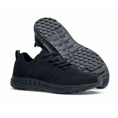 The Everlight™ Eco Men's Black from Shoes For Crews are slip-resistant trainers built with a recycled mesh upper that is water-resistant and breathable. Designed to keep your feet cool and ventilated, pair seen from the right side and the sole.