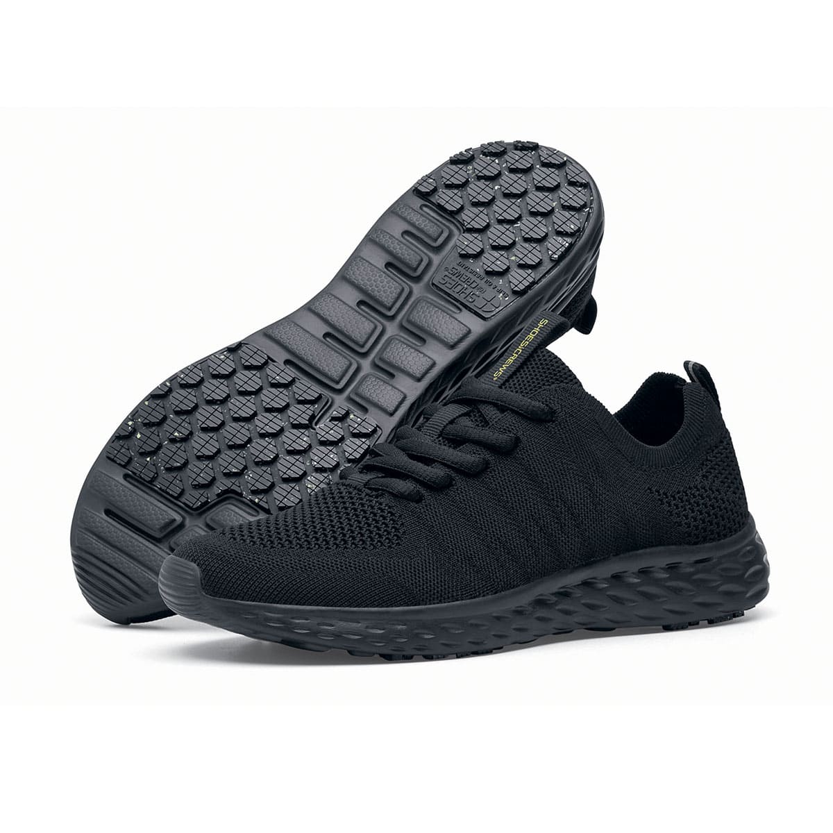 The Everlight™ Eco Men's Black from Shoes For Crews are slip-resistant trainers built with a recycled mesh upper that is water-resistant and breathable. Designed to keep your feet cool and ventilated, pair seen from the left side and the sole.