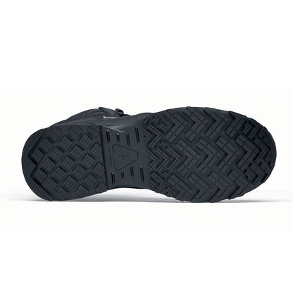 The Guard Mid from Shoes For Crews are waterproof slip-resistant safety boots with a safety toe cap, seen from below.