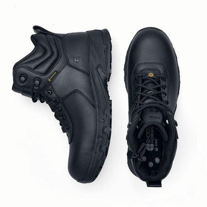 The Guard Mid from Shoes For Crews are waterproof slip-resistant safety boots with a safety toe cap, seen vertically from the side and from above.