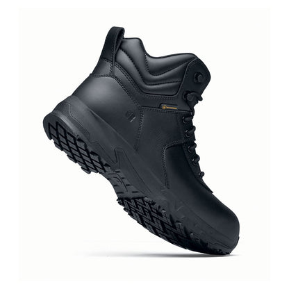 The Guard Mid from Shoes For Crews are waterproof slip-resistant safety boots with a safety toe cap, seen from the perpendicular.