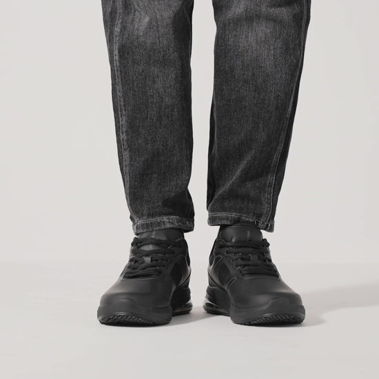 The Revolution II Black from Shoes For Crews are slip-resistant trainers designed to provide comfort, product video.