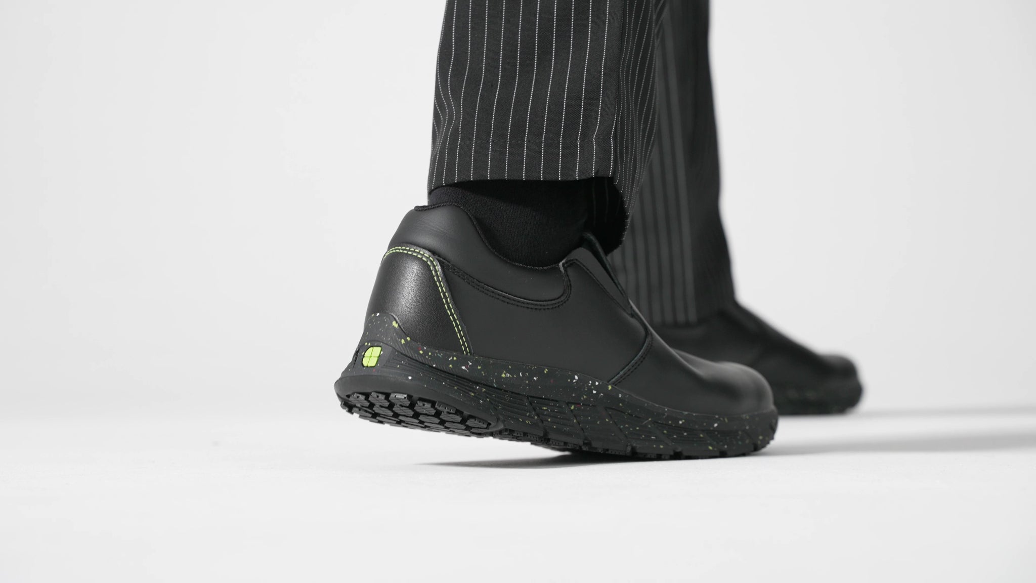 The Shoes for Crews Cater Eco Men's Black is a sustainable, slip-resistant safety shoe, product video.