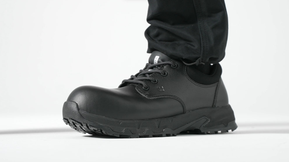 Black slip resistant safety shoe with composite toe cap (200 joules), designed with puncture-resistant materials, product video.