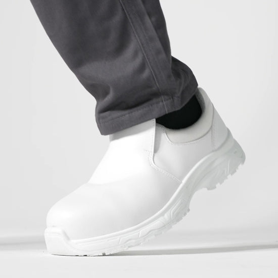 The Catania White from Shoes For Crews, made in Italy, is a slip-resistant shoe with a composite safety toe cap and a puncture-resistant midsole, product video.